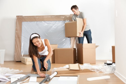 Professional movers handling furniture during a Maida Vale home move