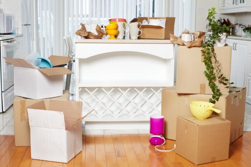 Team collecting bulky household furniture from a Maida Vale flat